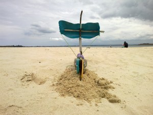 flotsam rubbish sailing boat