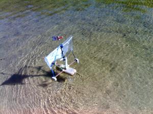 Sailing flotsam rubbish boat. 