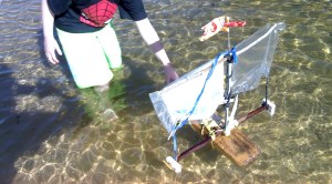 Sailing flotsam rubbish boat. 