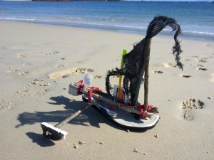 flotsam rubbish sailing boat